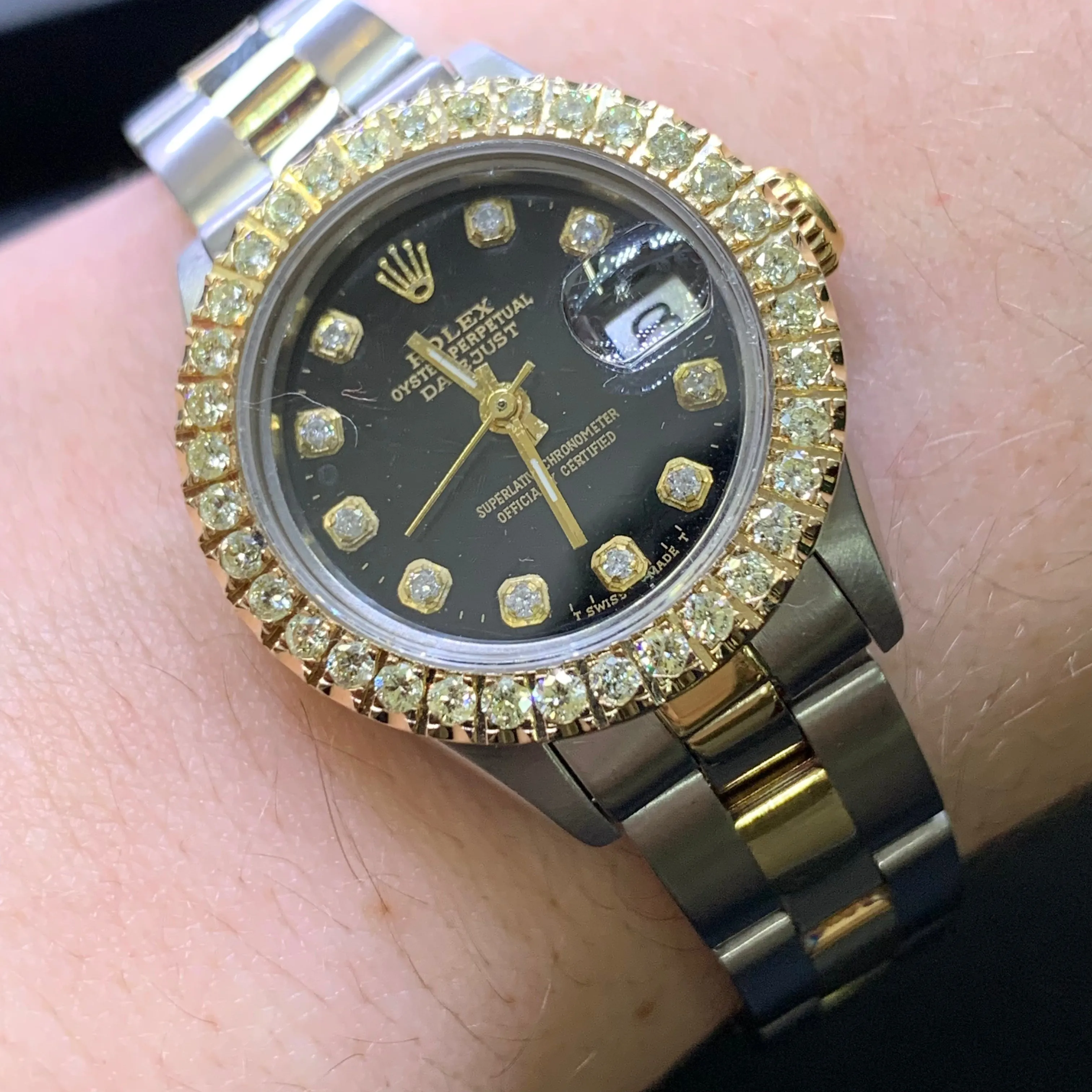 26mm Ladies’ Rolex Datejust Diamond Watch with Two-tone Oyster Bracelet (custom black diamond dial)