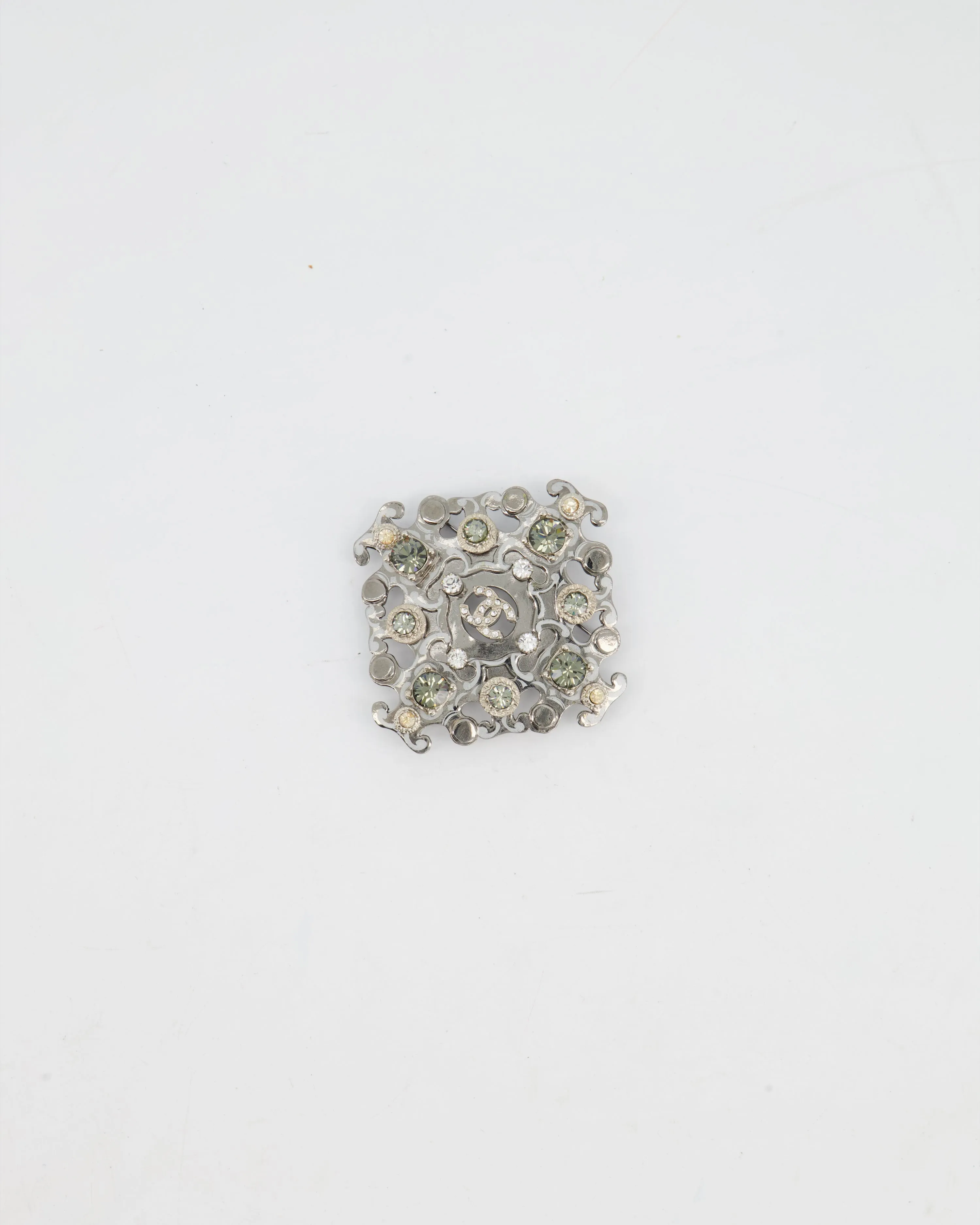 Chanel Silver Brooch With Logo And Crystal Details